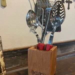Cutco kitchen utensil set in red. Used